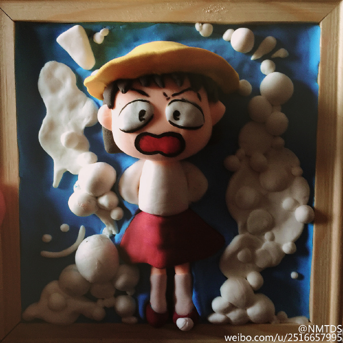 用粘土做出来的小丸子人偶画做法