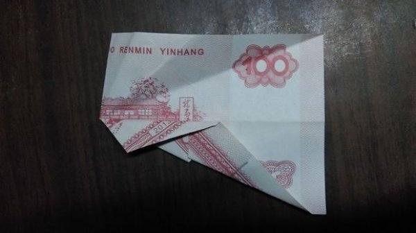 莲花折纸步骤 纸币五瓣莲图片8