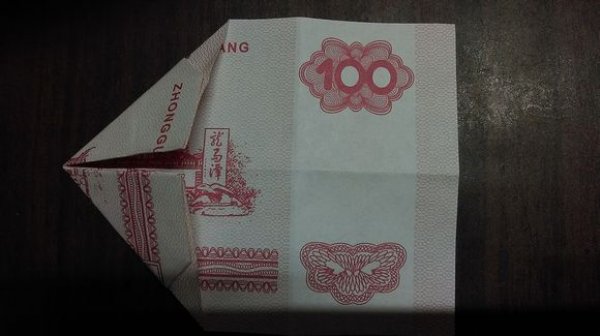 莲花折纸步骤 纸币五瓣莲图片5