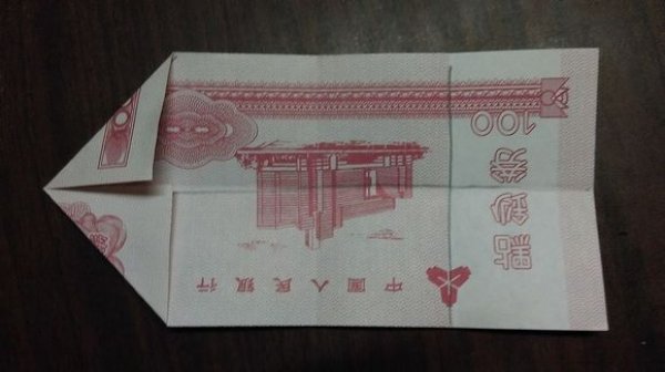 莲花折纸步骤 纸币五瓣莲图片2