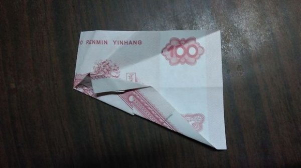 莲花折纸步骤 纸币五瓣莲图片7